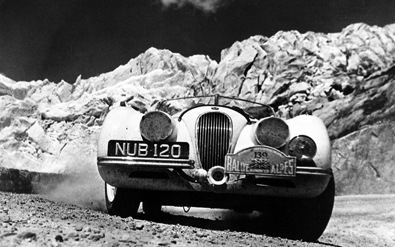 The Jaguar XK120 on Furka Pass, Switzerland during the 1950 Alpine Rally.